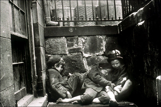 An 1888 photograph of New York children, by Jacob Riis (from the exhibition Children at Risk �Protecting New York City's Youths, 1653-2003), New York Historical Society, November 2003.
